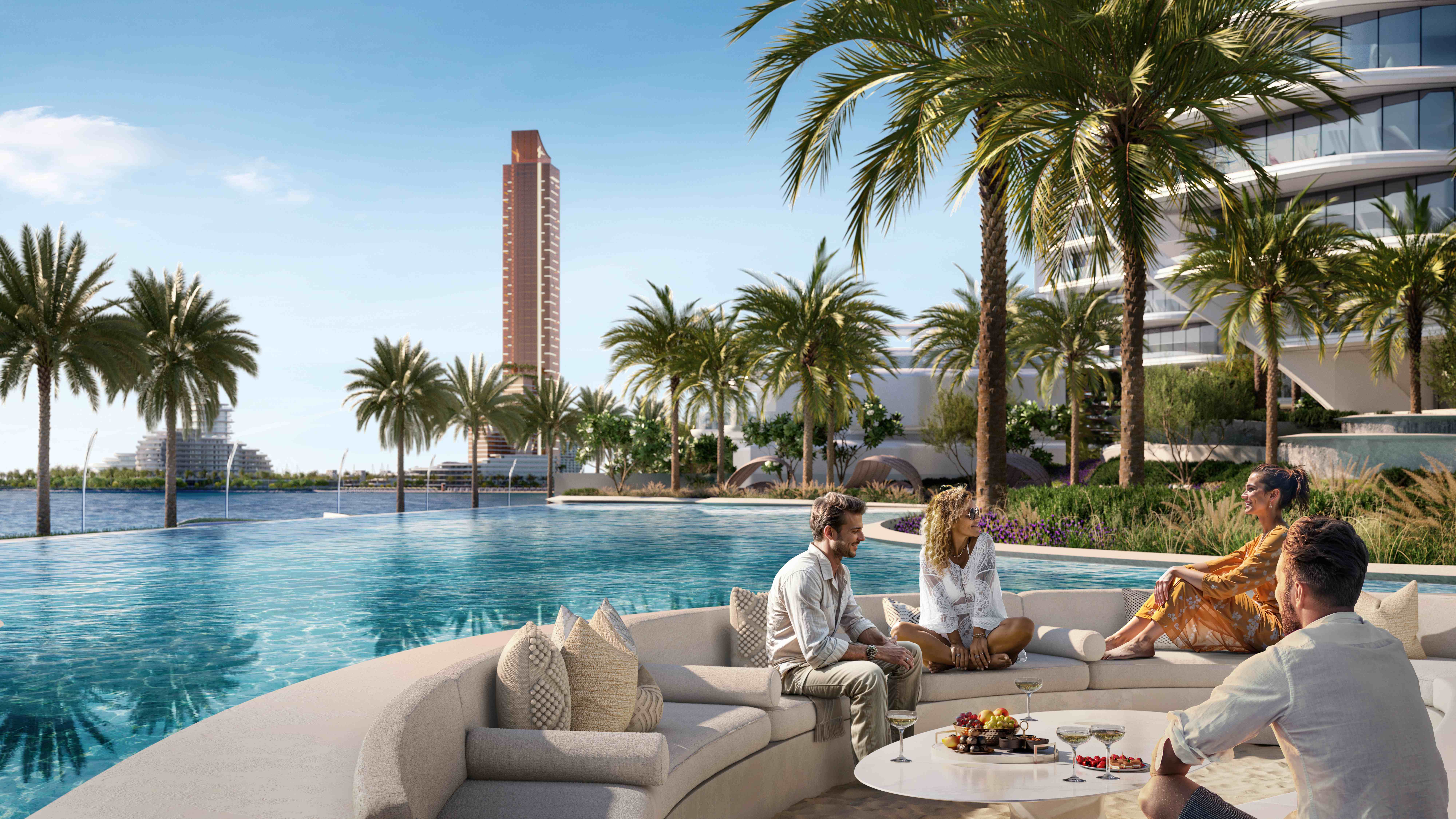 Poolside Luxury Living - Al Marjan Island Exclusive poolside lounge area with curved beige sofas, infinity pool, palm trees, and Wynn tower backdrop at Al Marjan Island beach club