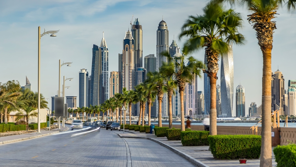 45 Minutes from Dubai - Al Marjan Island Location Dubai Marina skyline showing proximity to Al Marjan Island - only 45 minutes drive to Dubai international airport and business district