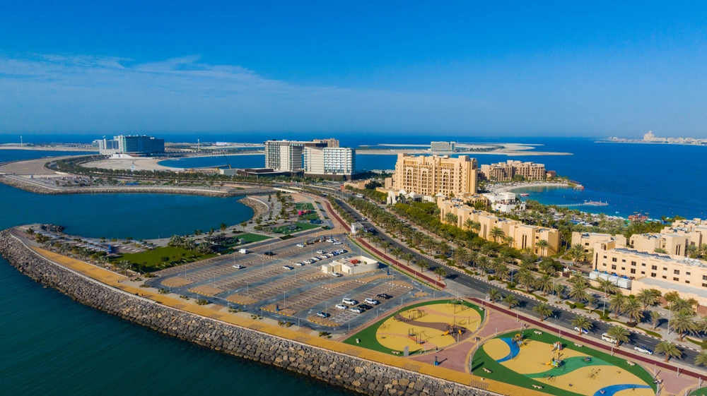 Master-Planned Island Development - Al Marjan Island Al Marjan Island aerial masterplan view showing 4-island development spanning 2.7 million square meters with resorts, residences, parks and beaches in Ras Al Khaimah UAE