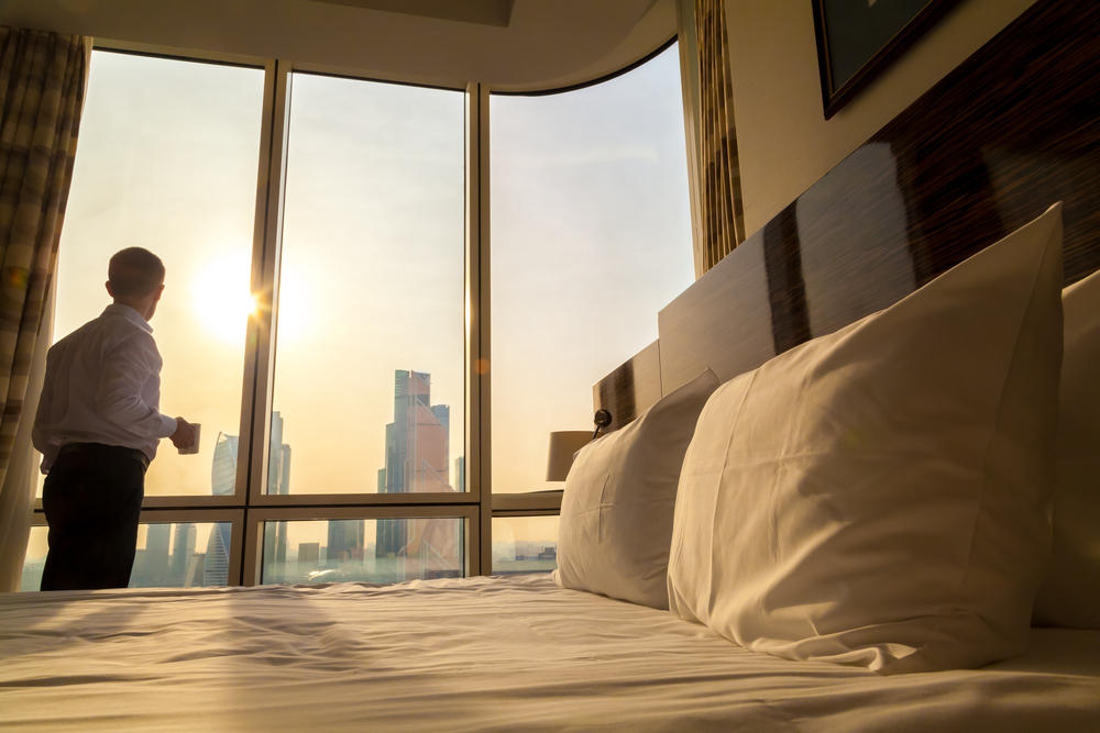 Luxury hotel suite with panoramic city views managed by Gabriella for premium rental yields
